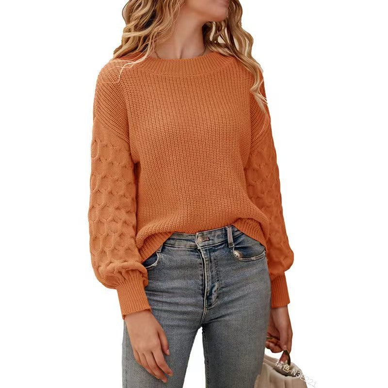 Pull à manches ballon, coloris orange, porté en tenue