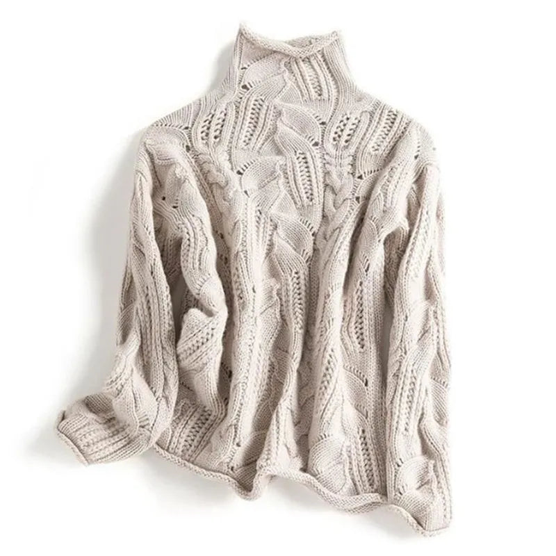 Pull ajouré col roulé, coloris beige, présenté à plat