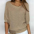 Pull ample à col bateau, coloris beige, vu de face