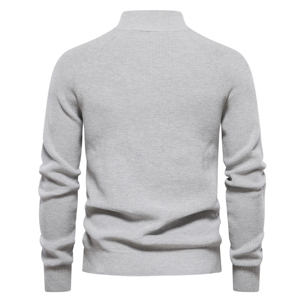 Dos du pull gris clair chiné, col montant côtelé et manches raglan