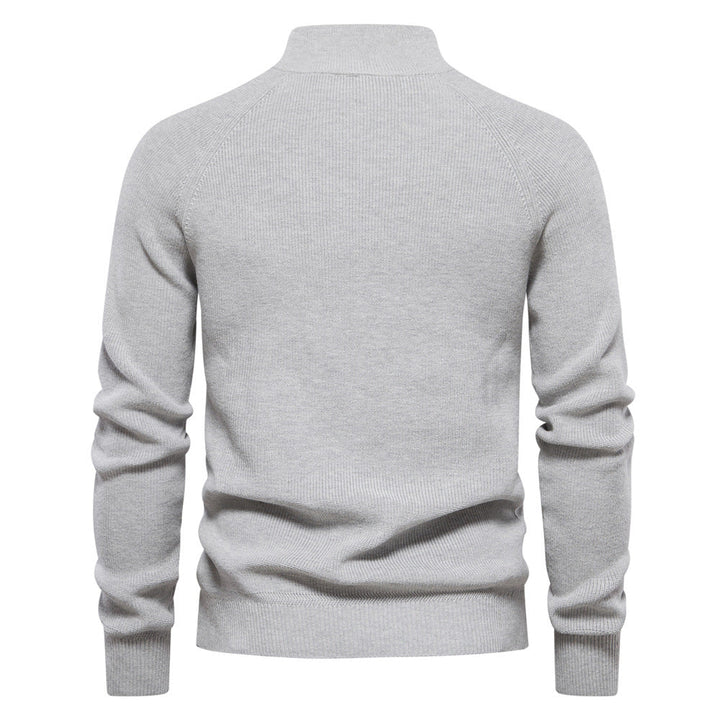 Dos du pull gris clair chiné, col montant côtelé et manches raglan