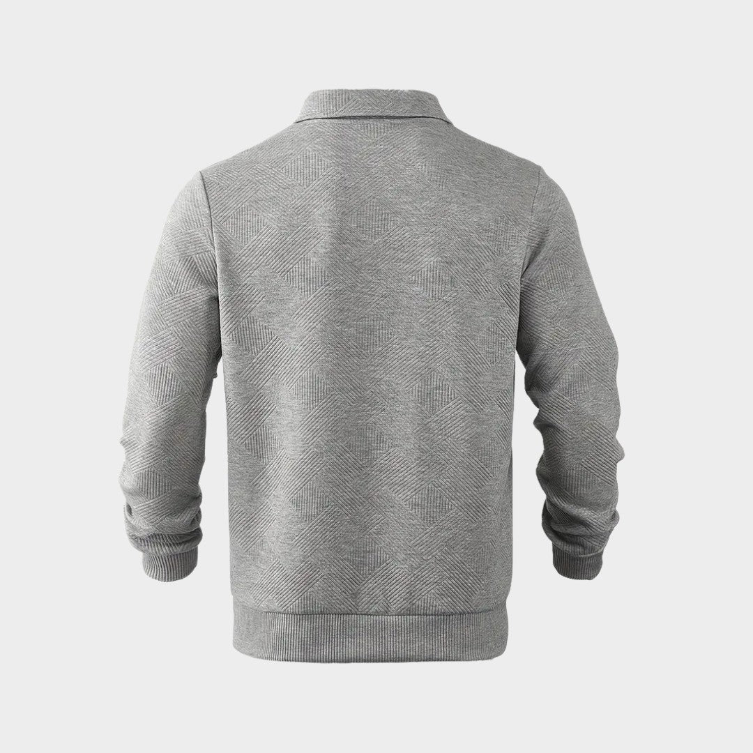 Dos du pull à col polo gris chiné, motif en relief