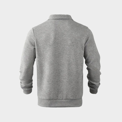 Dos du pull à col polo gris chiné, motif en relief