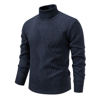 Pull col roulé à losanges, coloris bleu marine, présenté à plat