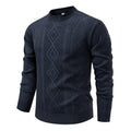 Pull à losanges bleu marine en maille fine, col rond, vue de face