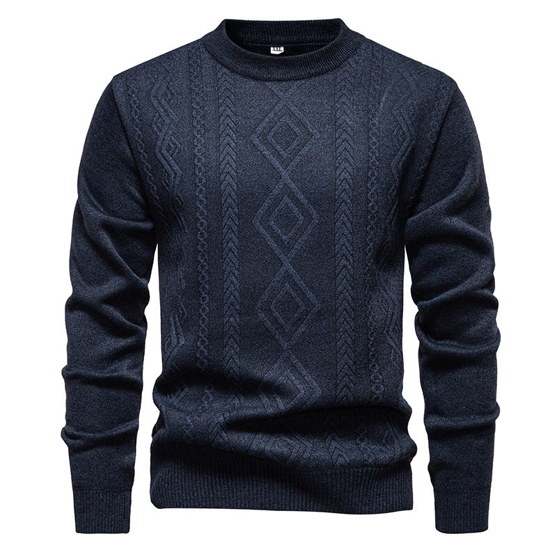 Pull à losanges bleu marine en maille fine, col rond, présenté à plat