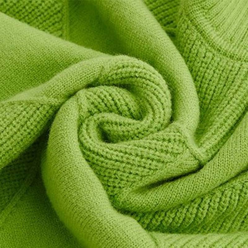 Pull losanges col roulé, détail de la maille et des côtes