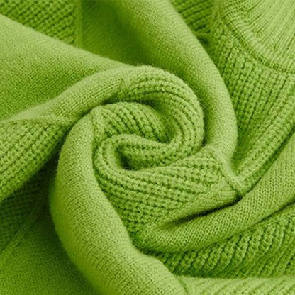Pull losanges col roulé, détail de la maille et des côtes