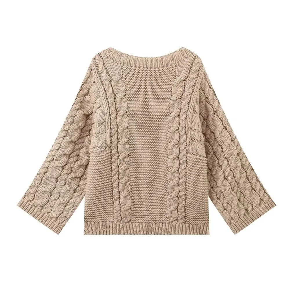 Pull oversize à torsades, coloris kaki, présenté seul