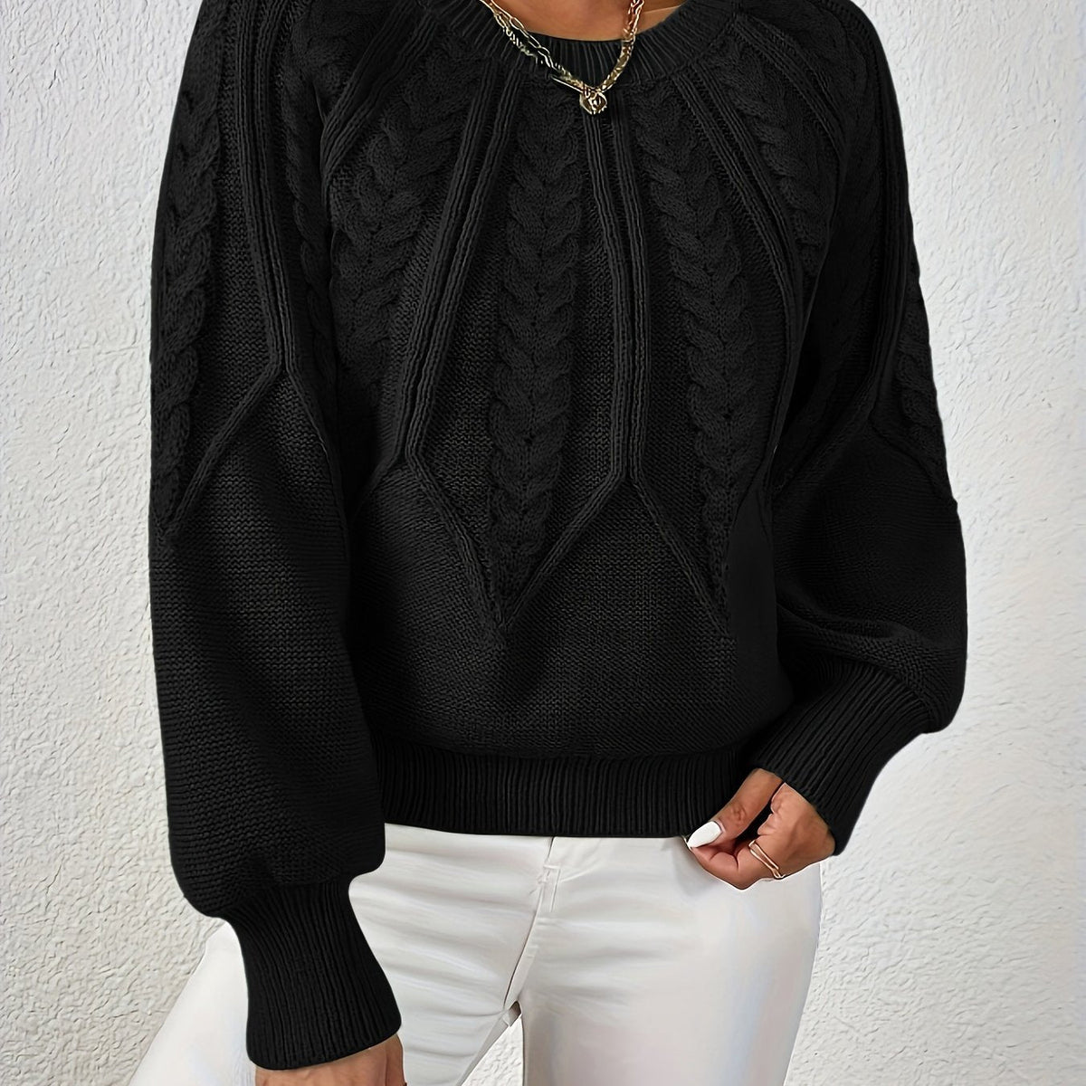 Pull torsadé col rond pour femme, coloris noir