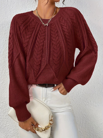 Pull torsadé col rond
