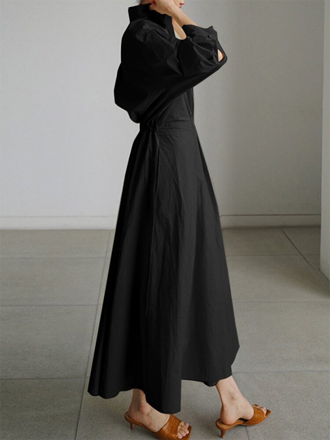 Robe chemise longue évasée, coloris noir, vue de profil