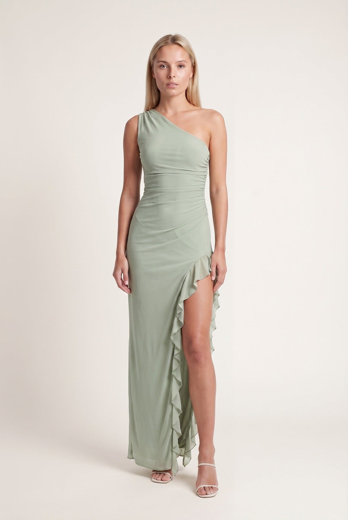 Robe longue asymétrique volants, coloris vert sauge, vue de face