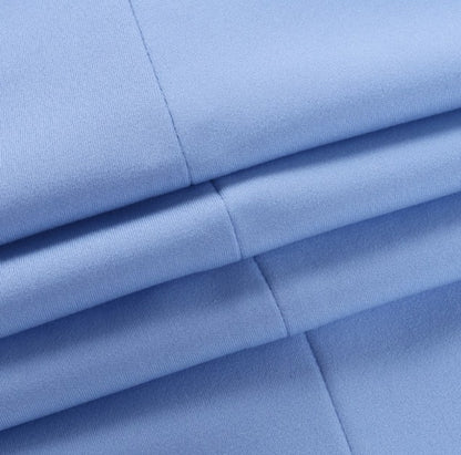 Robe longue col montant, détail du drapé du buste