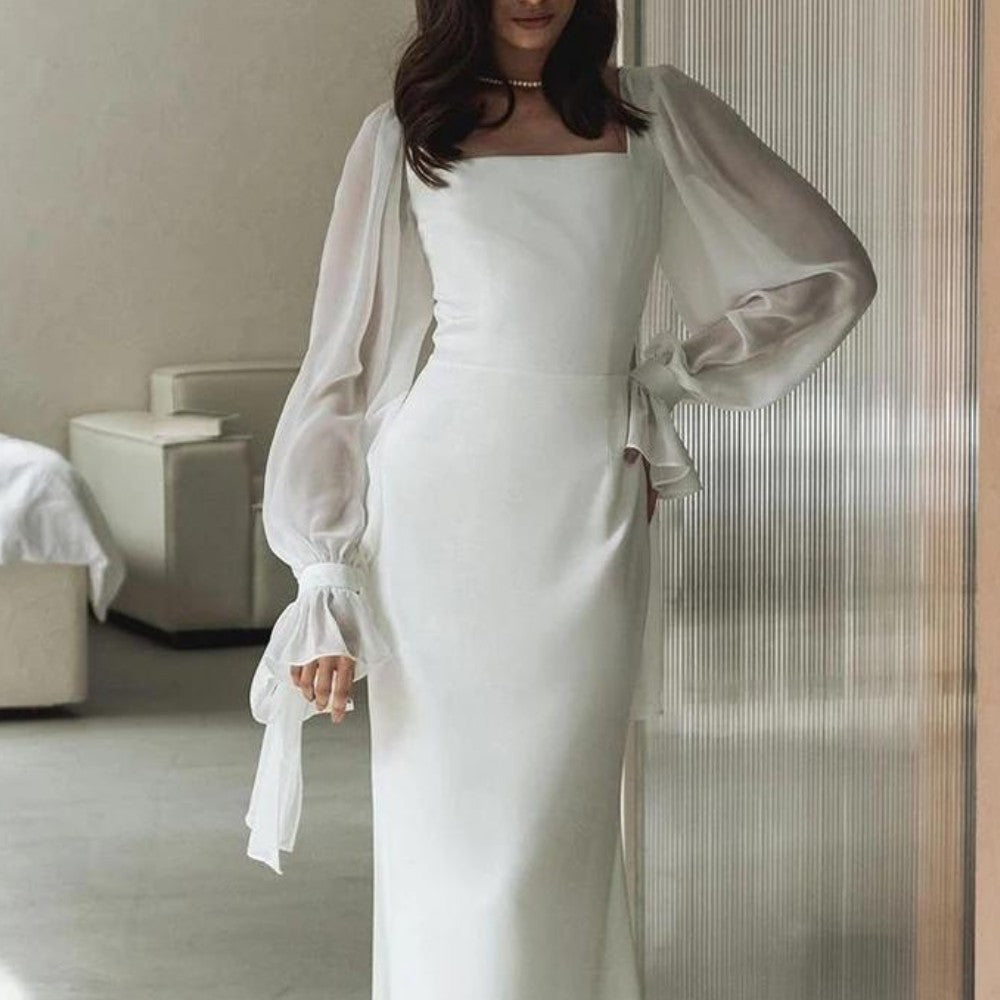 Robe longue blanche ajustée à manches bouffantes, vue de face