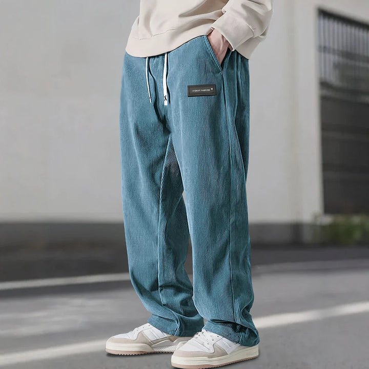 Pantalon en velours côtelé bleu canard à cordon, large côte et étiquette noire