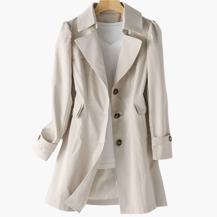 Trench mi-long, coloris beige, présenté sur cintre