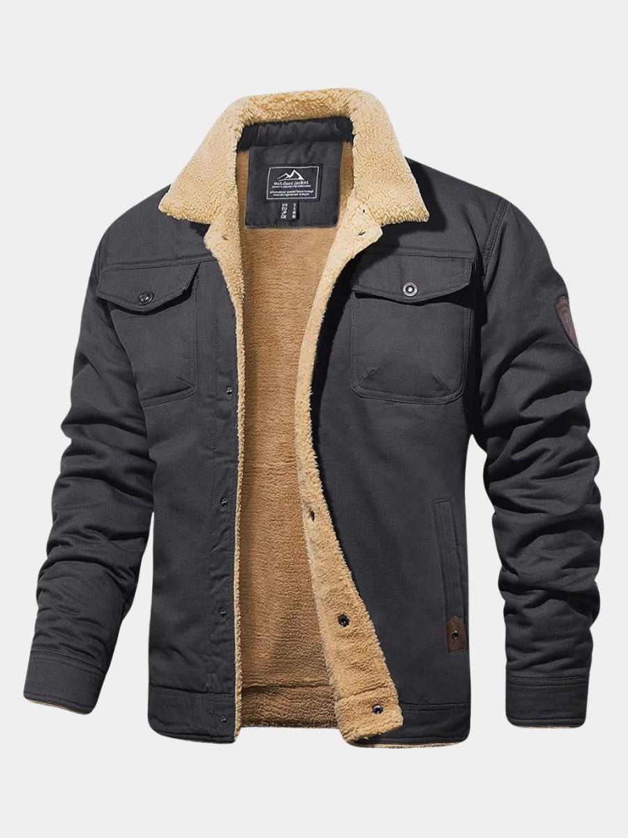 Veste en coton gris anthracite doublée sherpa écru, col en peau lainée et poches à rabat
