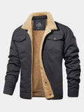 Veste en coton gris anthracite doublée sherpa écru, col en peau lainée et poches à rabat