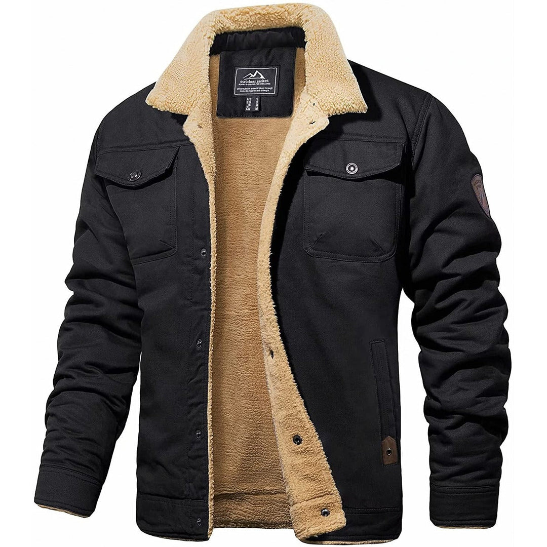 Veste en coton noir doublée de sherpa écru, col en peau lainée et poches poitrine