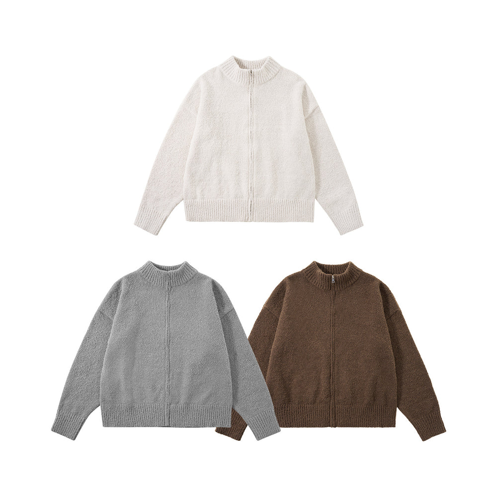 Veste en maille à col montant et fermeture zippée, déclinée en écru, gris et marron
