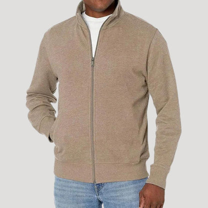 Veste zippée unie beige portée sur un t-shirt blanc, vue de face