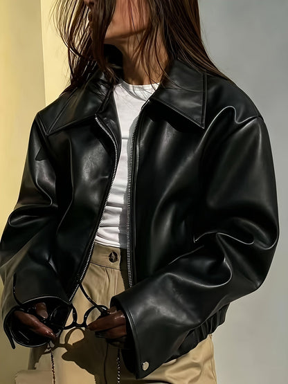 Veste zippée col rabattu, coloris noir, porté en tenue